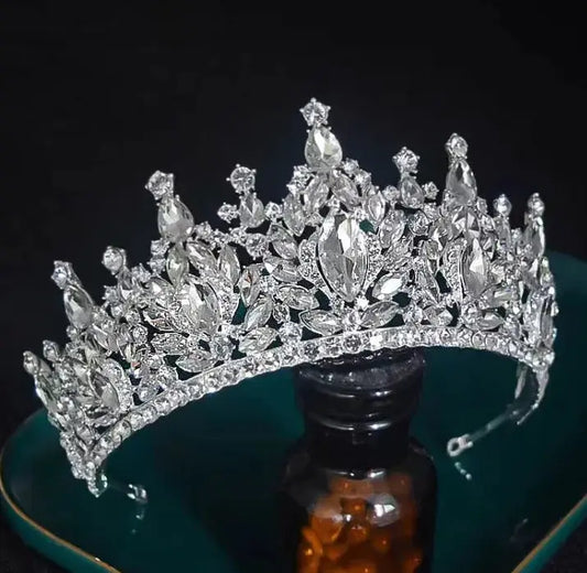 Silver tiara on a dark background