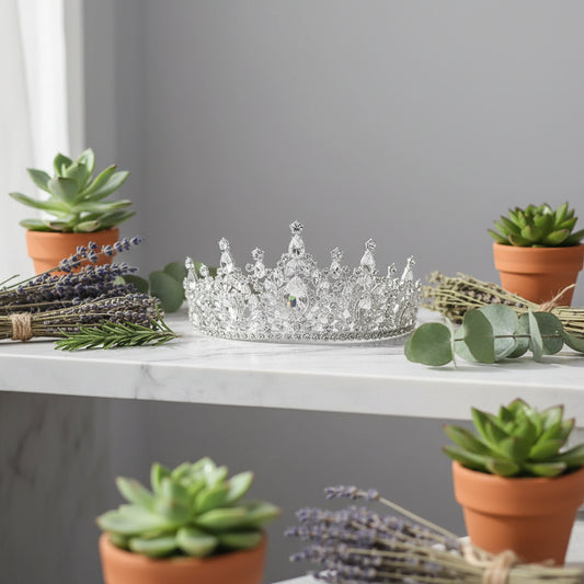 Silver tiara with clear stones on a dark background