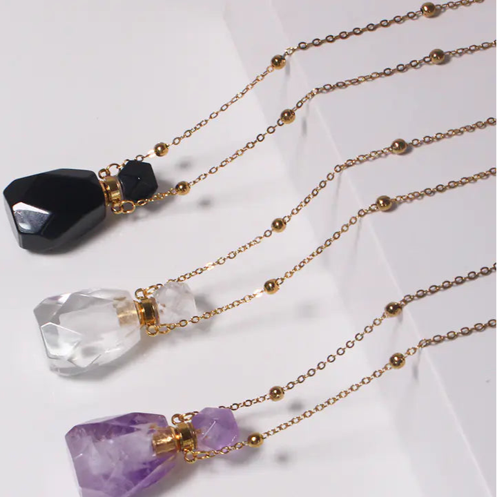 Necklace with crystal pendants on a white background