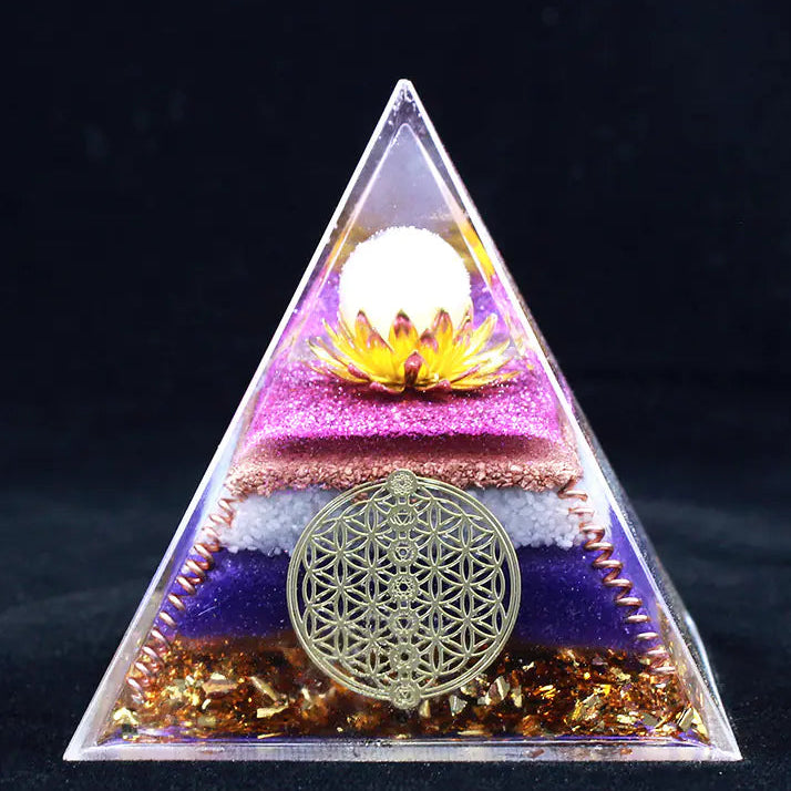 Triangular pyramid with decorative elements on a dark background