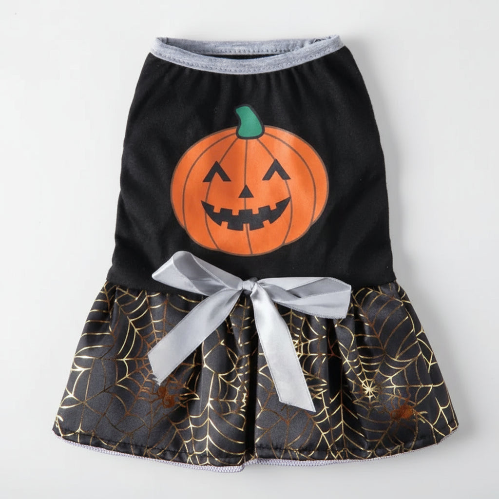 Halloween-themed pet dress with pumpkin design and spider web pattern on a white background