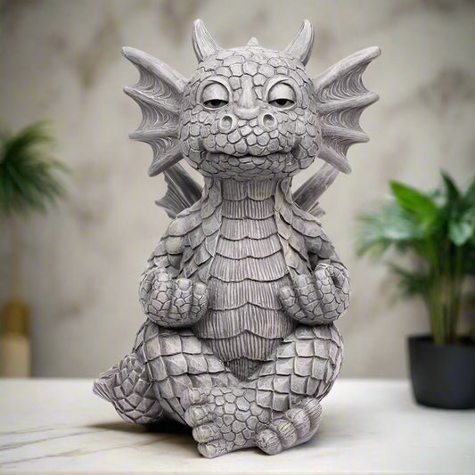 Gray dragon statue on a white background