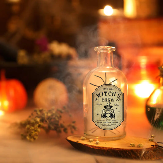 Glass bottle labeled 'Witch's Brew' with a Halloween-themed background