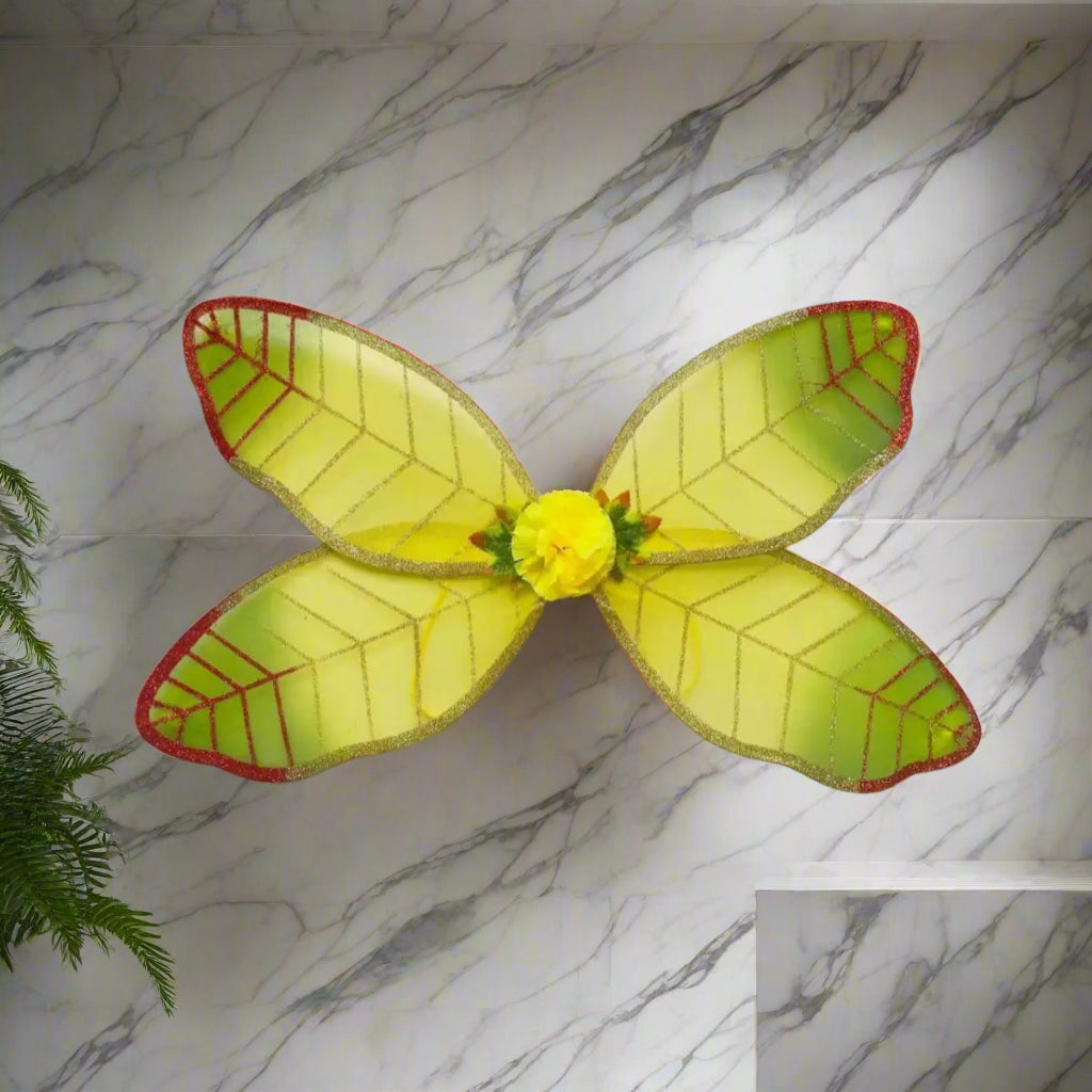 Yellow fairy wings with red edges on a white background