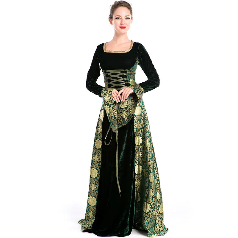 Woman wearing a black and green medieval-style dress on a white background