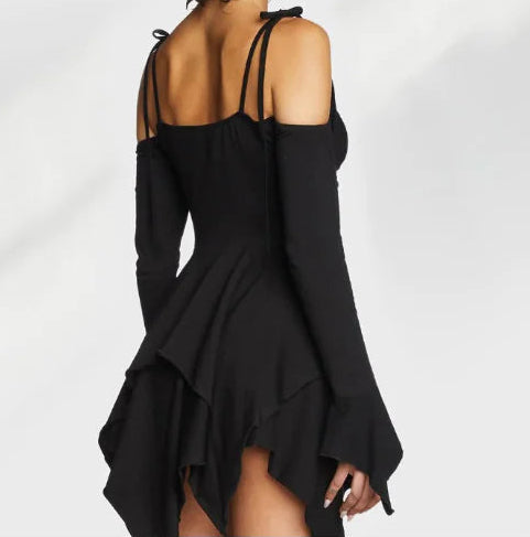 Black off-shoulder dress with long sleeves on a white background