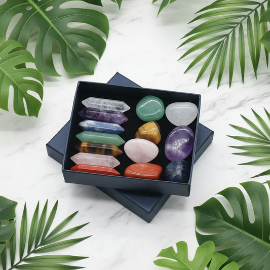 Set of colorful crystals in a black box on a white background