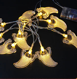 String of banana-shaped lights on a black background