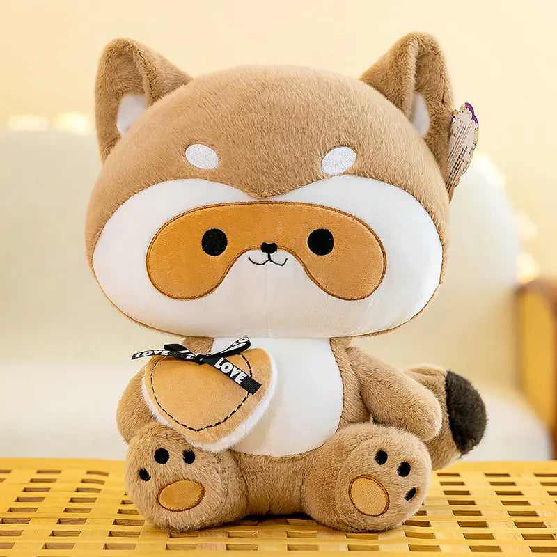 Plush toy resembling a dog with a white chest and brown body on a wooden surface.