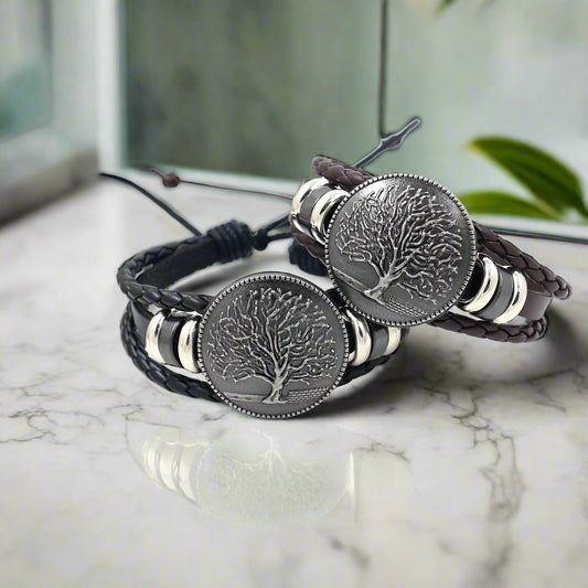 Bracelet with tree-of-life design on a white background