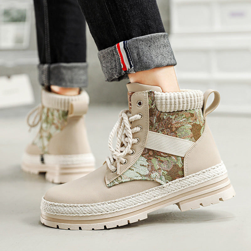 Beige boots with camouflage pattern on a light background