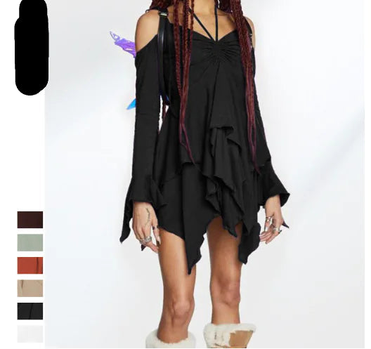 Black dress with ruffled layers worn by a model, with 'fushi' brand logo on the left.