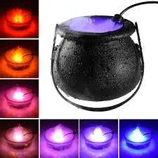 Black stone lantern with colorful LED lights on a black background