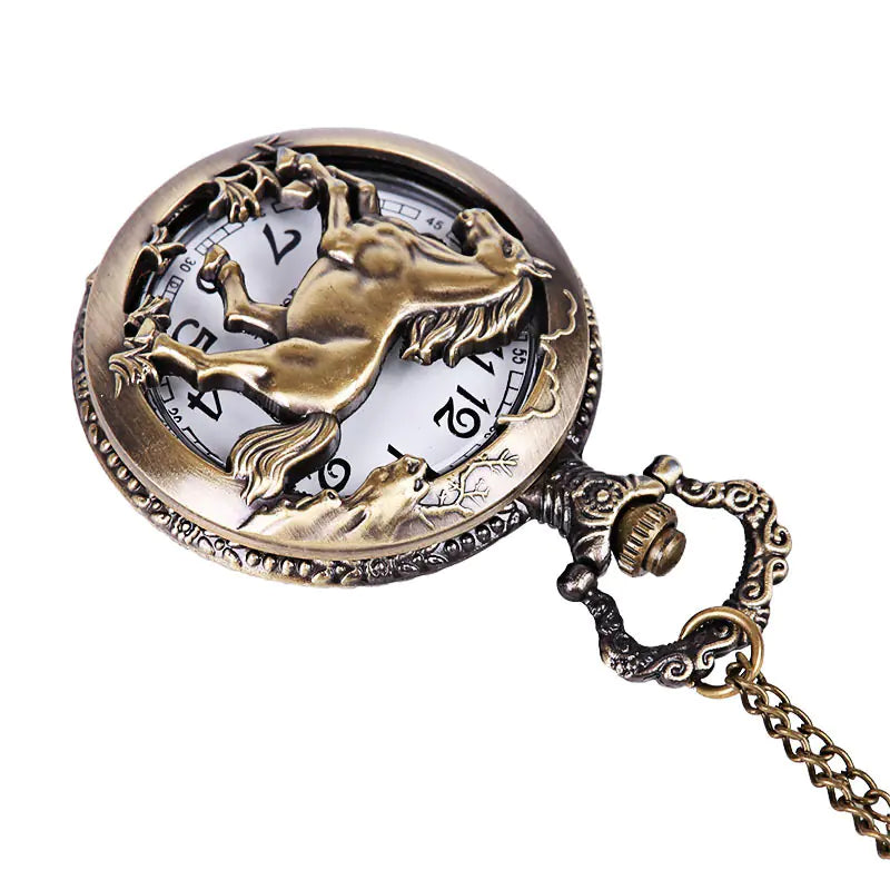 Bronze pocket watch with horse design on a white background