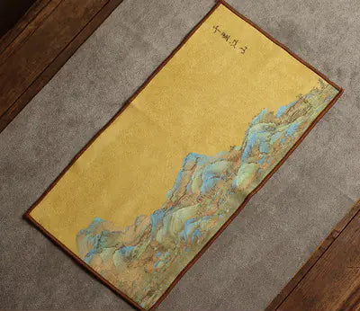 Decorative rug with artistic design on a wooden floor
