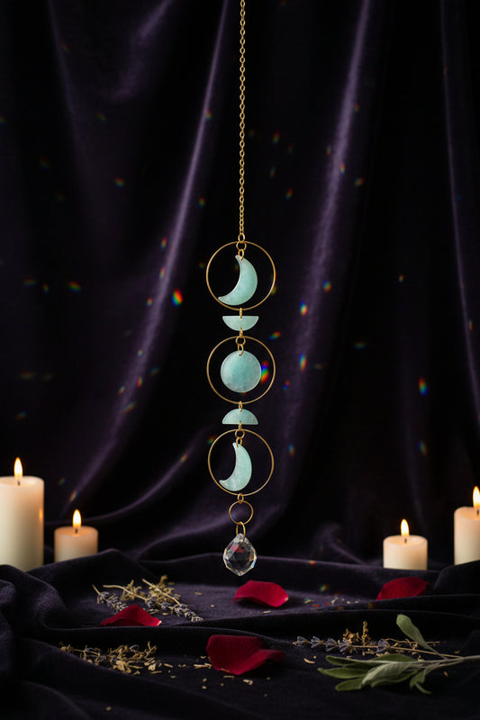 Decorative hanging chain with turquoise stones on a neutral background