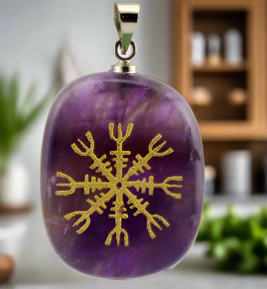 Purple pendant with gold snowflake design on a white background