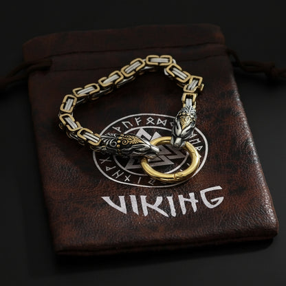 Bracelet with wolf design on a brown drawstring bag labeled 'Viking'.