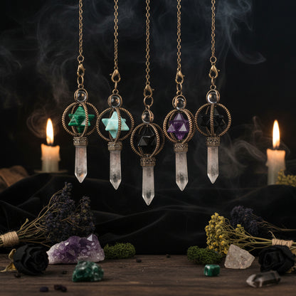 Five crystal pendant necklaces with geometric stone designs on a white background.