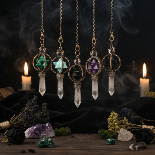 Five crystal pendant necklaces with geometric stone designs on a white background.