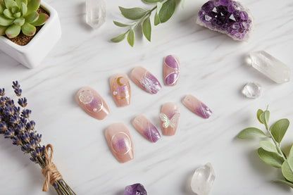 Set of pink and purple nail art designs on a light blue background