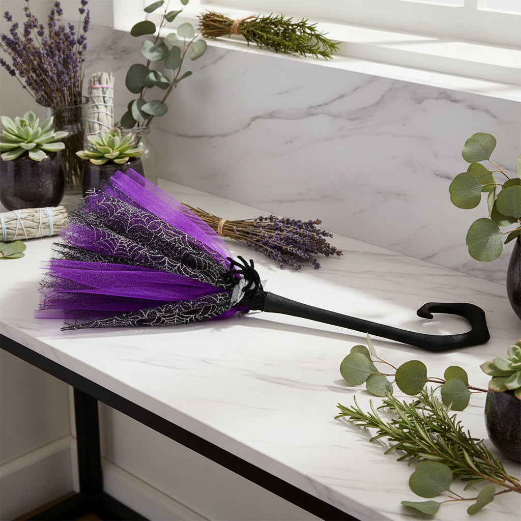 Halloween costume accessory with purple tulle skirt and black spider web design on a white background