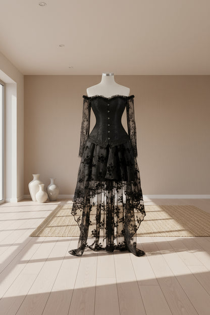 Gothic-style black dress with floral lace details on a white background