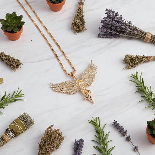 Gold goddess crystal pendant necklace on a black background
