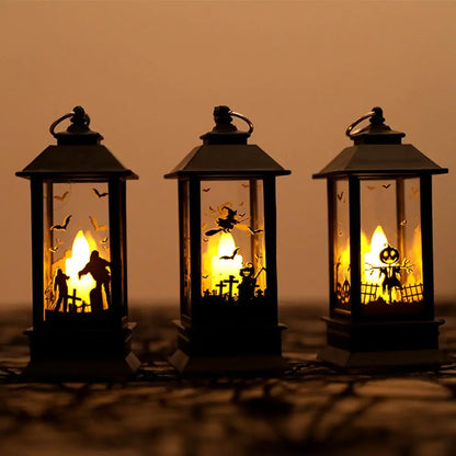 Three Halloween-themed lanterns with glowing interior scenes on a dark background.