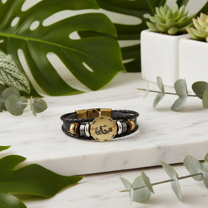 Bracelet with gold and bronze accents on a white background