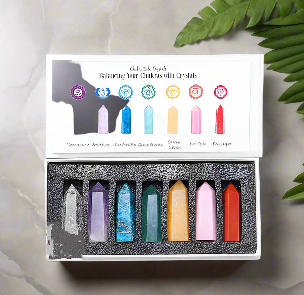 Set of colorful crystals in a box with labels on a white background