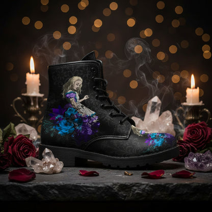 Black boot with floral and fairy design on a white background