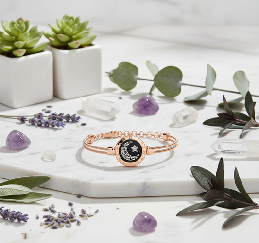 Two bracelets with moon and star design and sun and moon design on a white background