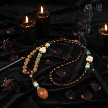 Decorative necklace with beads on a textured fabric background