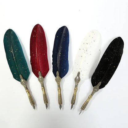 Set of six decorative feathers with ornate gold bases on a white background
