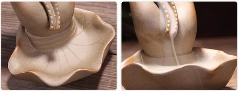 Close-up of a ceramic teapot spout on a wooden surface