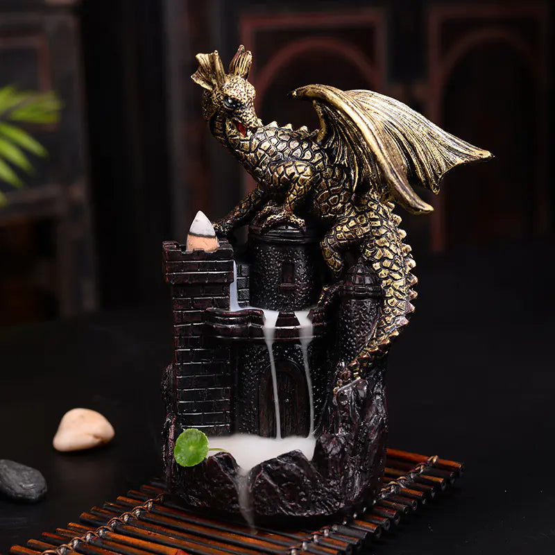 Decorative dragon sculpture with water feature on a dark background