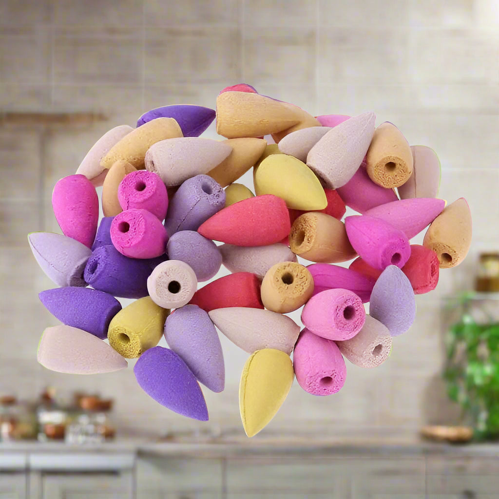 Assorted colored incense cones on a white background with '100 pcs' text.