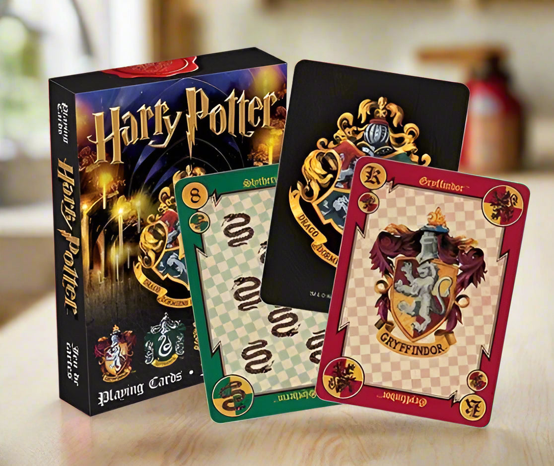 Harry Potter playing cards with Hogwarts houses on a white background