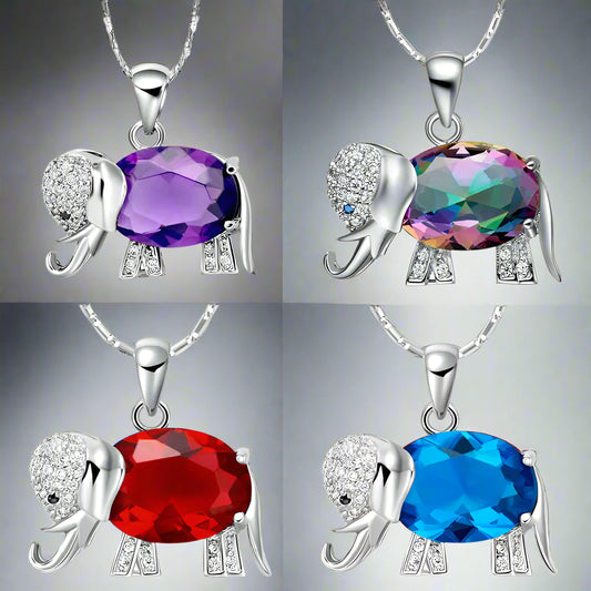 Four elephant-shaped pendants with colorful gemstones on a white background
