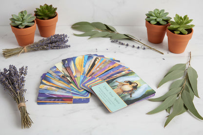Set of tarot cards with colorful artwork on a white background