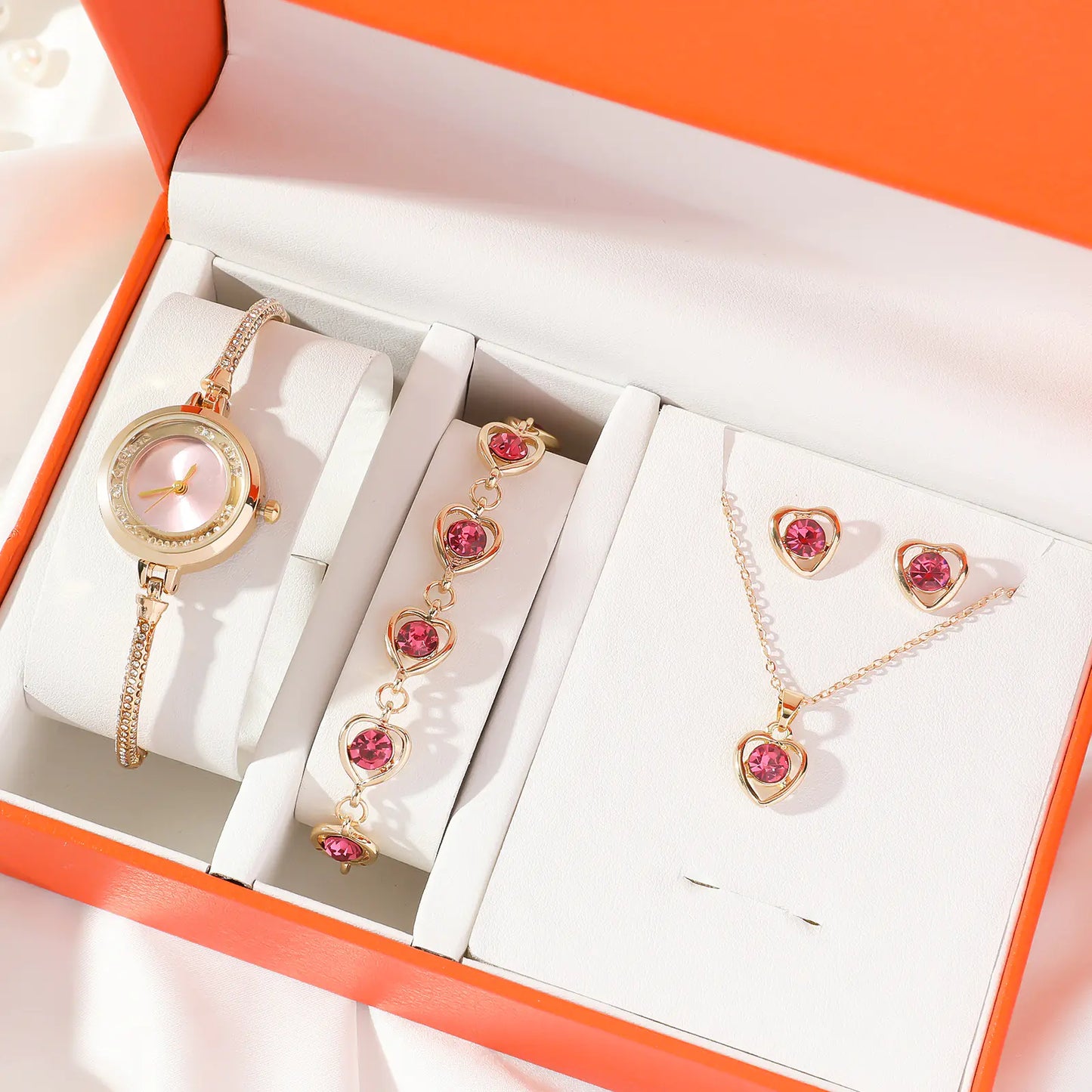 Jewelry set with watch, earrings, and necklace in a box