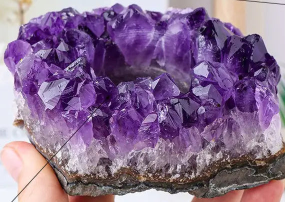 Purple crystal rock held by a hand with text indicating size and customization options.