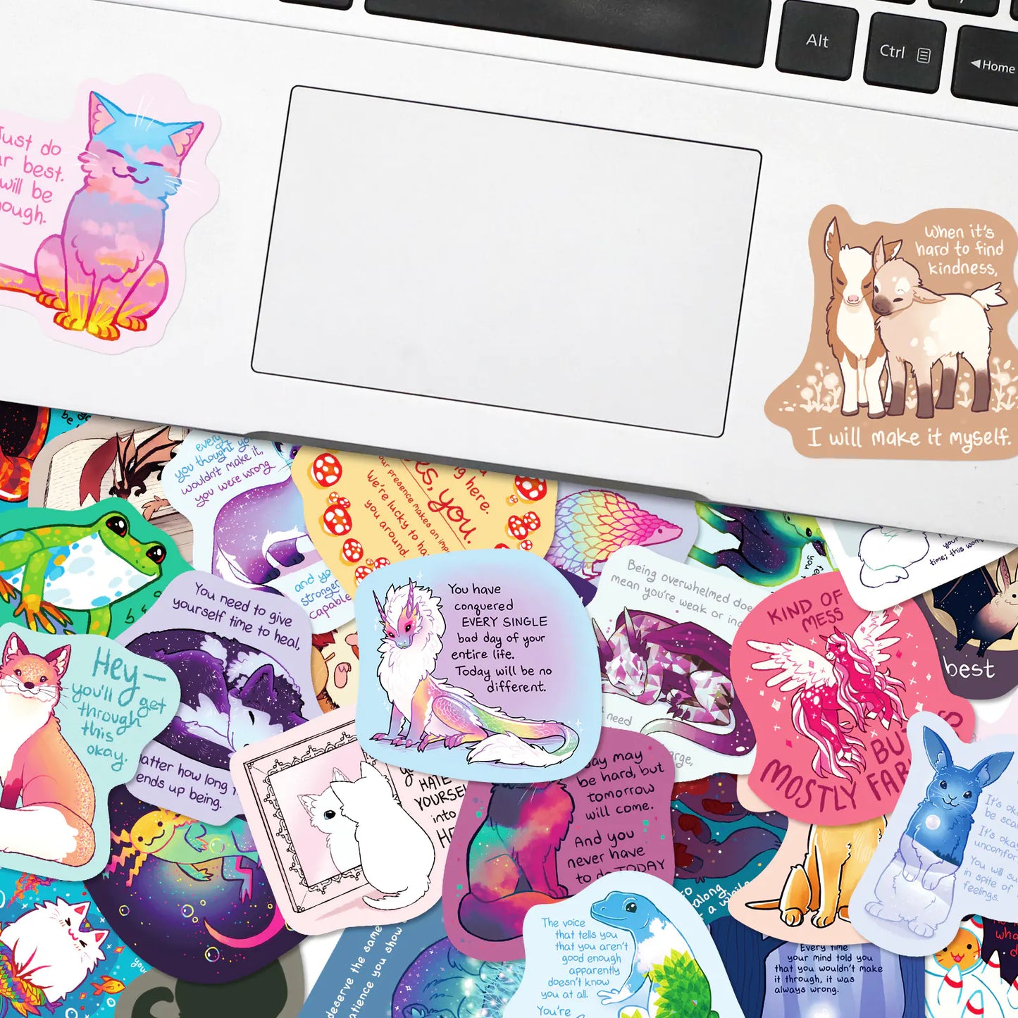 Collection of colorful stickers on a laptop keyboard