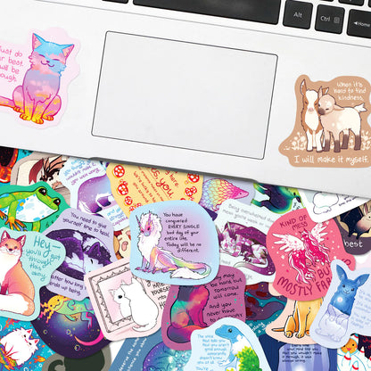 Collection of colorful stickers on a laptop keyboard
