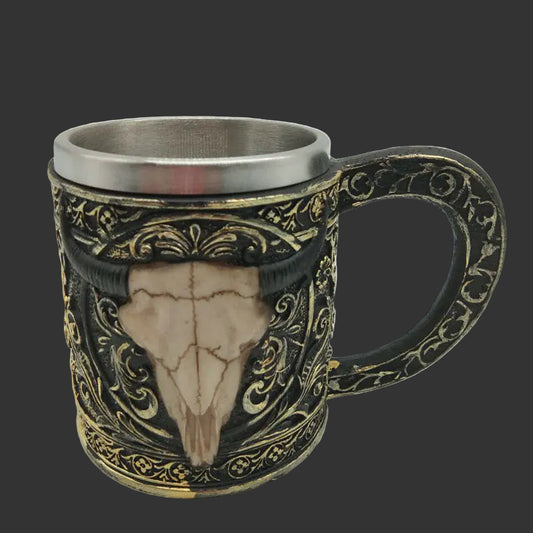Decorative mug with bull skull design and ornate patterns on a white background