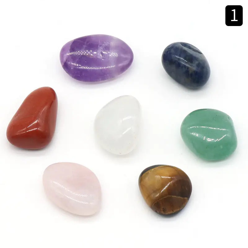 Collection of various colored stones on a white background