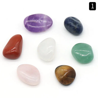 Collection of various colored stones on a white background