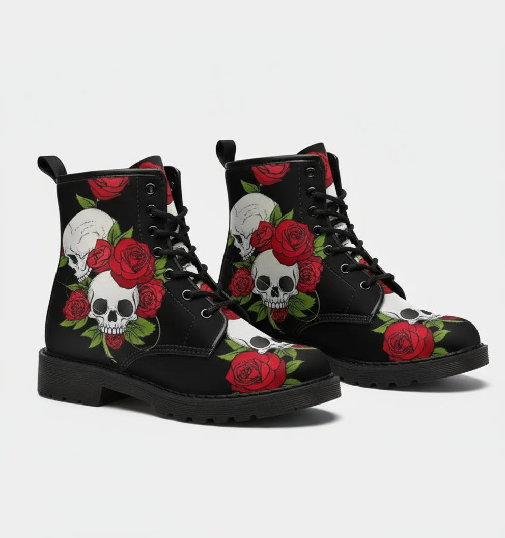 Black boots with skull and rose design worn by a person.