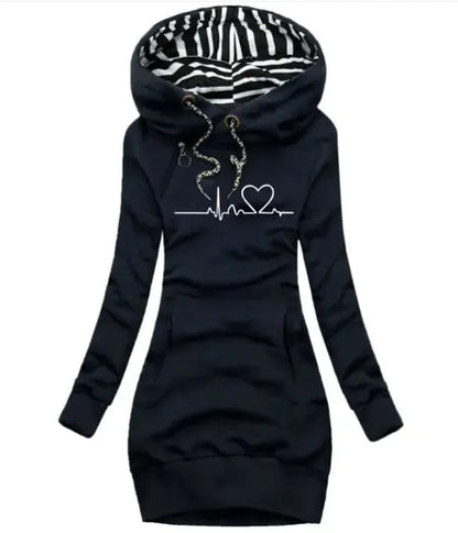 Black hoodie with zebra pattern lining on hood and heart design on chest against a white background